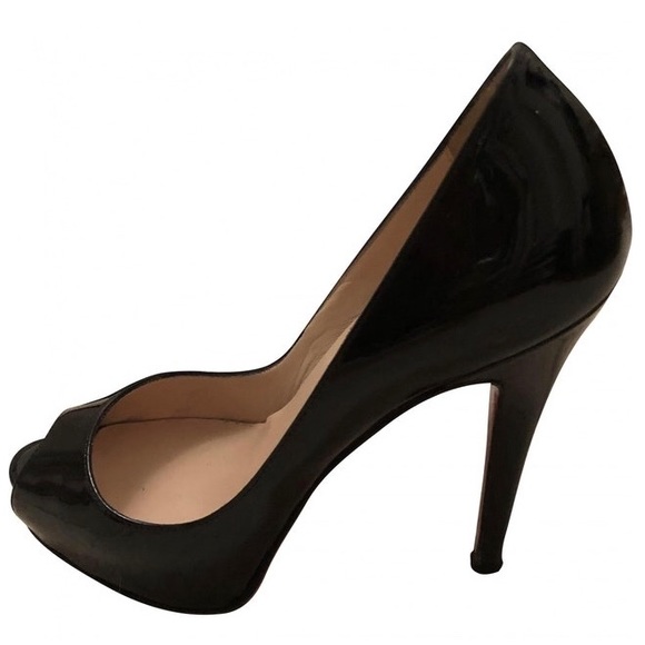 SOLD.    Christian Louboutin black heels - Picture 1 of 5
